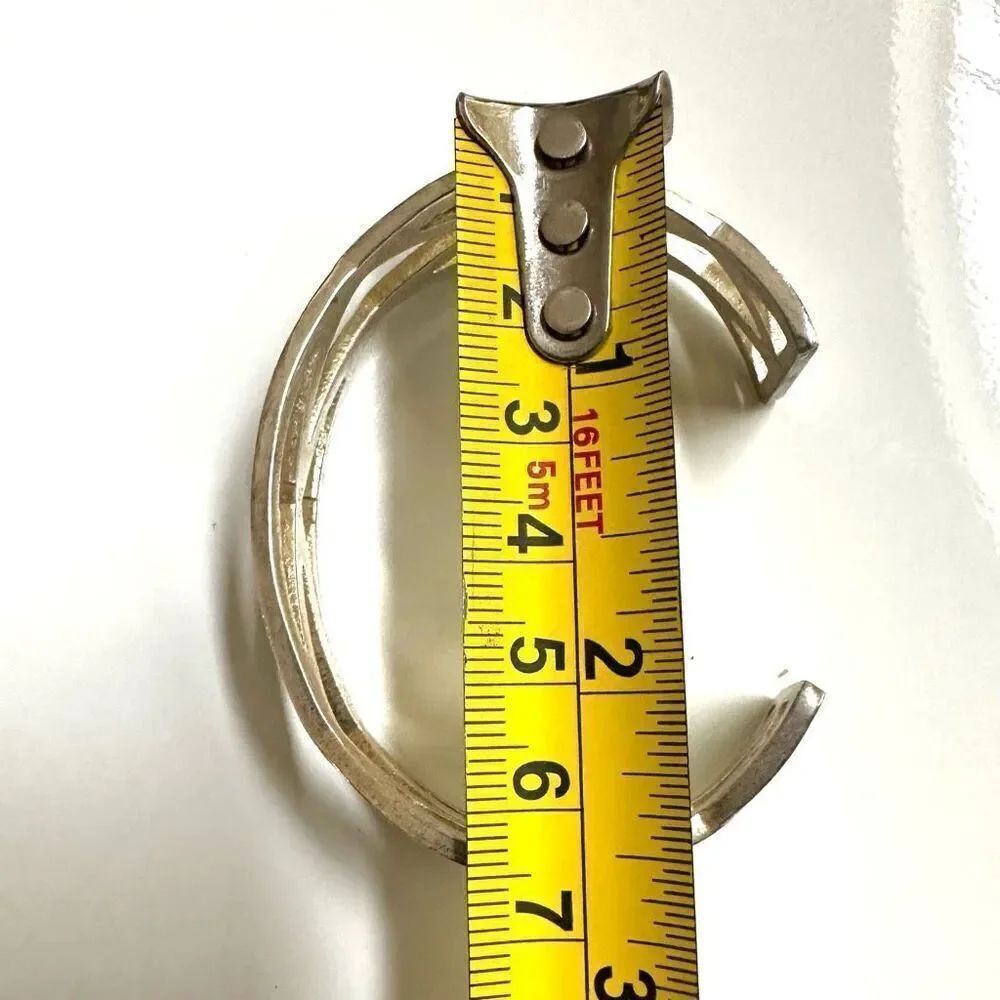 Silver tone cut out open cuff bracelet - Picture 5 of 9